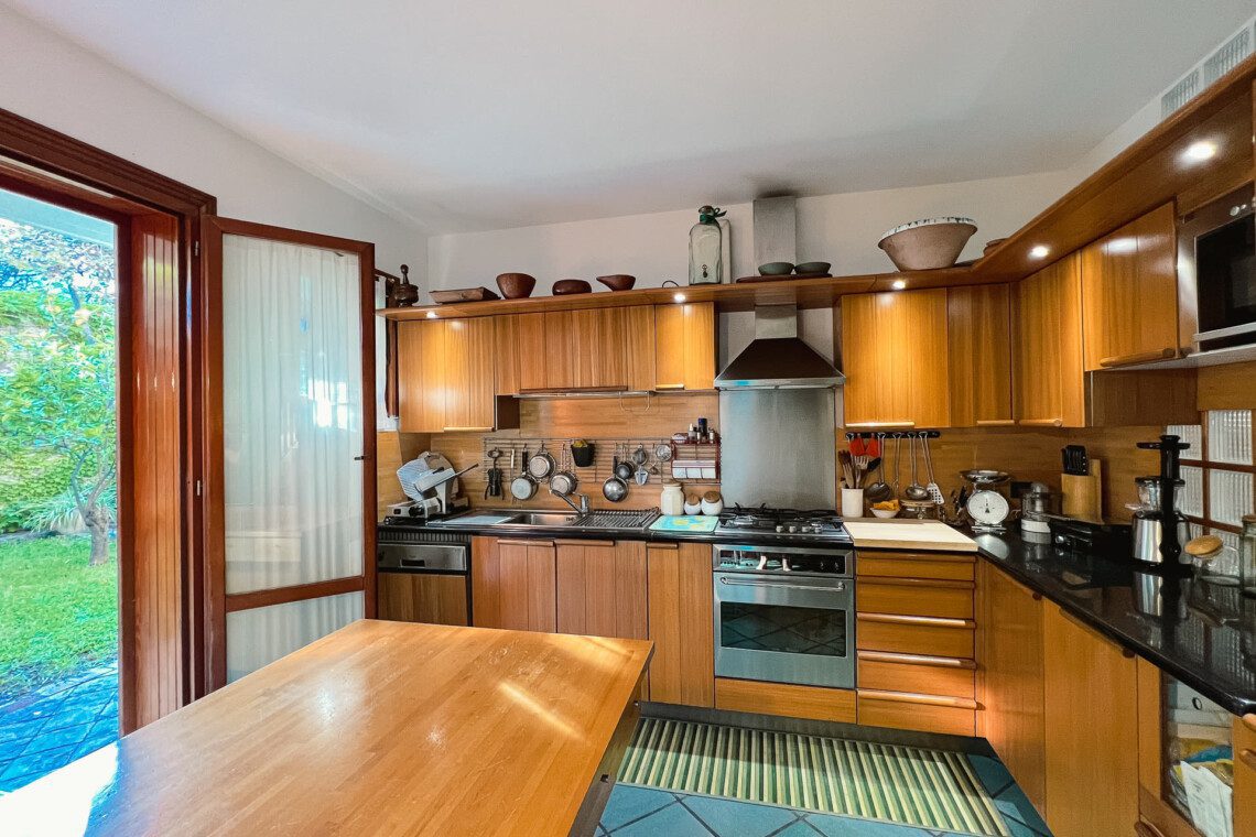 Cozy and modern kitchen in Catania townhouse, boasting authentic Italian charm and equipped for your perfect vacation stay.