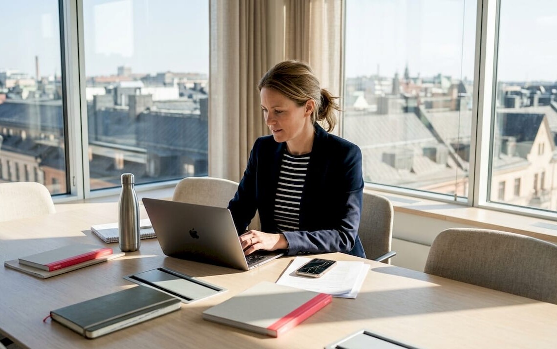 HR manager reviewing rental agreements in office