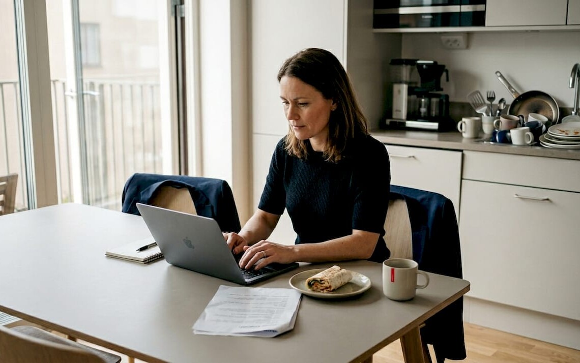 Professional working in a serviced apartment setting