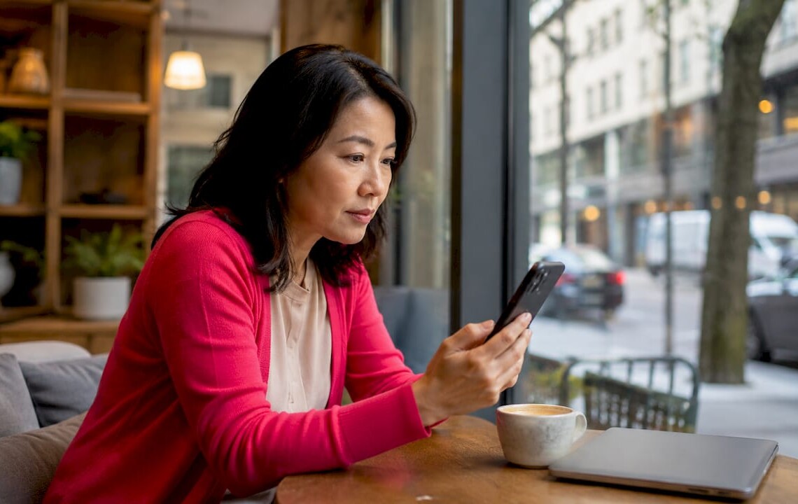 Businesswoman reviewing corporate housing options