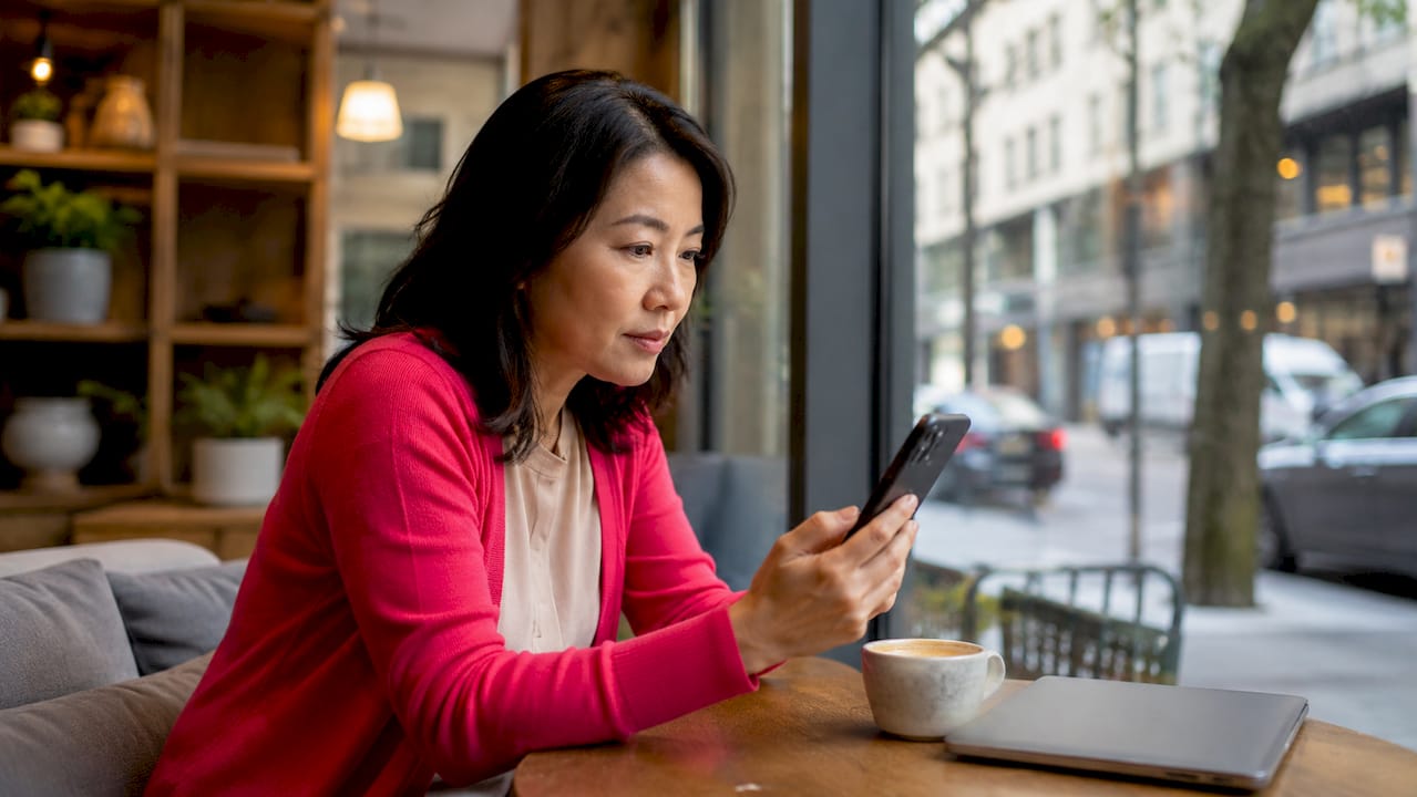 Businesswoman reviewing corporate housing options